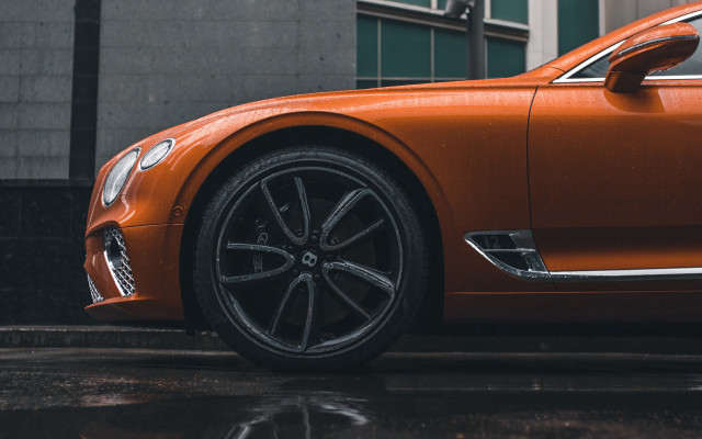 Car closeup rainy street building free wallpaper for desktop - medium preview image