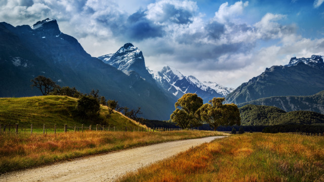 Dirt road grassy field mountains #2 free wallpaper for desktop - medium preview image