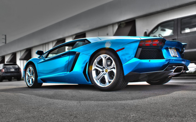 Blue sports car parking lot #4 free wallpaper for desktop - medium preview image