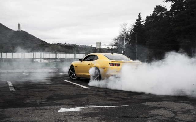 Yellow car smoke parking lot free wallpaper for desktop - medium preview image