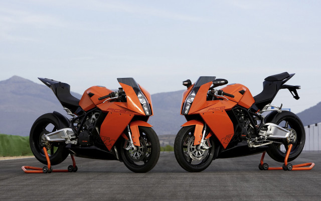 Orange motorcycles mountains symmetry digital free wallpaper for desktop - medium preview image