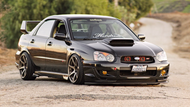 Black car dirtroad forest hillside free wallpaper for desktop - medium preview image