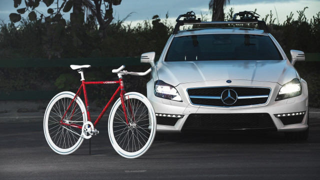 Red bike white car parking free wallpaper for desktop - medium preview image