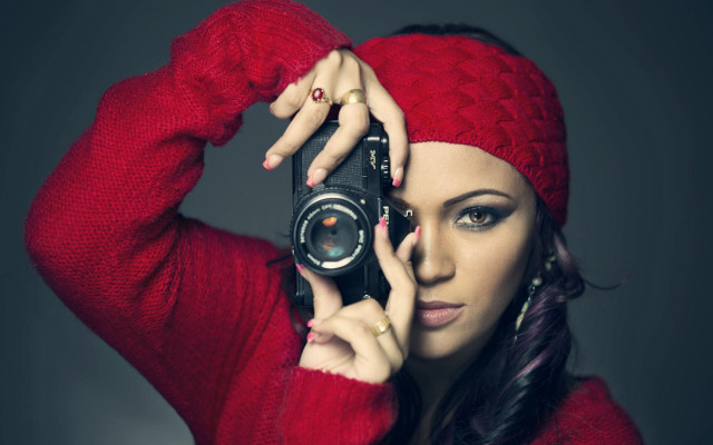 Woman red sweater camera portrait free wallpaper for desktop - medium preview image
