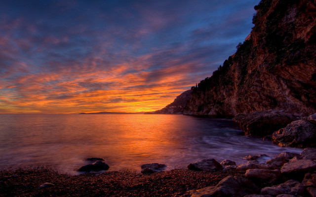 Sunset rocky beach water cliff #4 free wallpaper for desktop - medium preview image