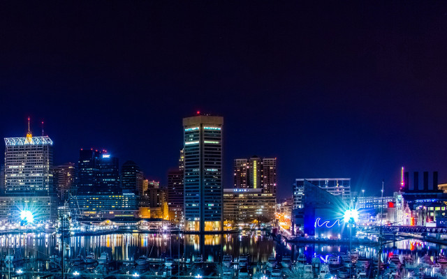 City skyline night lights boat free wallpaper for desktop - medium preview image