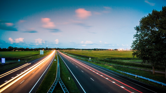 Highway trees night light streaks free wallpaper for desktop - medium preview image