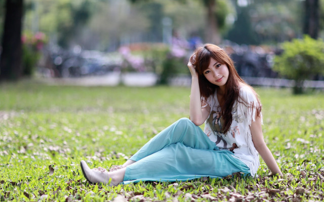 Woman park sitting white shirt free wallpaper for desktop - medium preview image