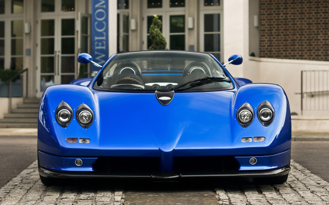 Blue sports car salon building free wallpaper for desktop - medium preview image