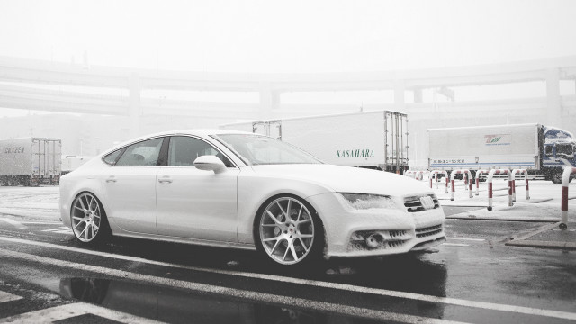 White car rain parking lot free wallpaper for desktop - medium preview image