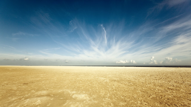Beach blue sky clouds footprints free wallpaper for desktop - medium preview image