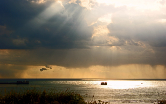 Boat sunset godrays mountain ocean free wallpaper for desktop - medium preview image