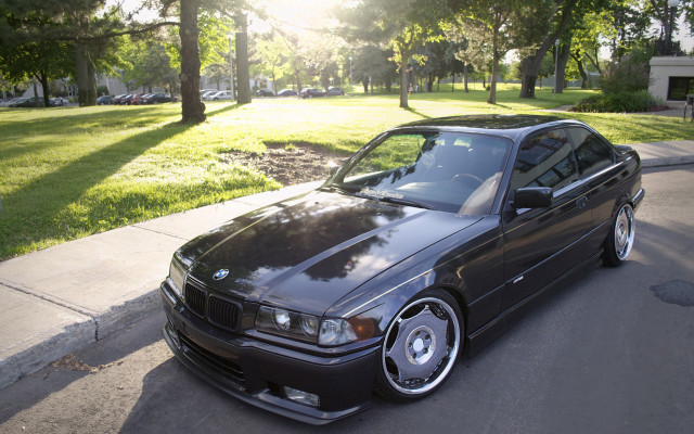 Black car park road trees free wallpaper for desktop - medium preview image