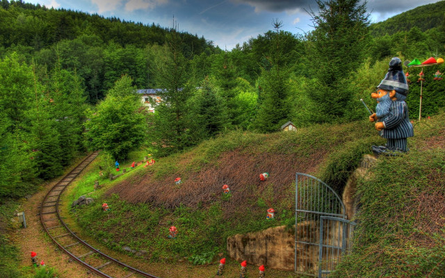Statue man traintrack forest ecological free wallpaper for desktop - medium preview image