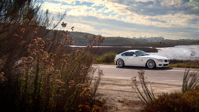 White sports car lake road free wallpaper for desktop - medium preview image