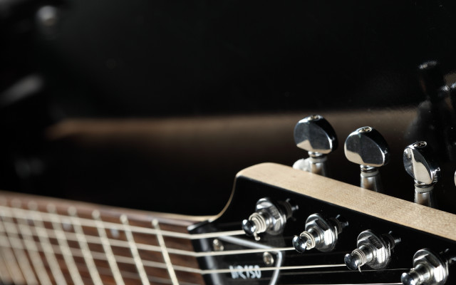 Guitar neck closeup black background #4 free wallpaper for desktop - medium preview image