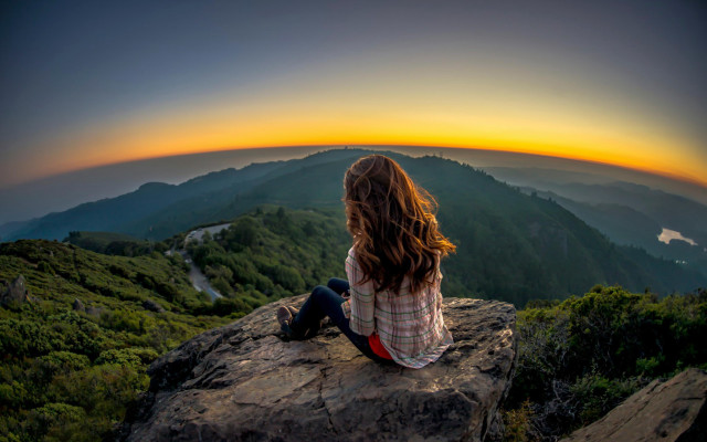 Woman sitting rock sunset valley free wallpaper for desktop - medium preview image
