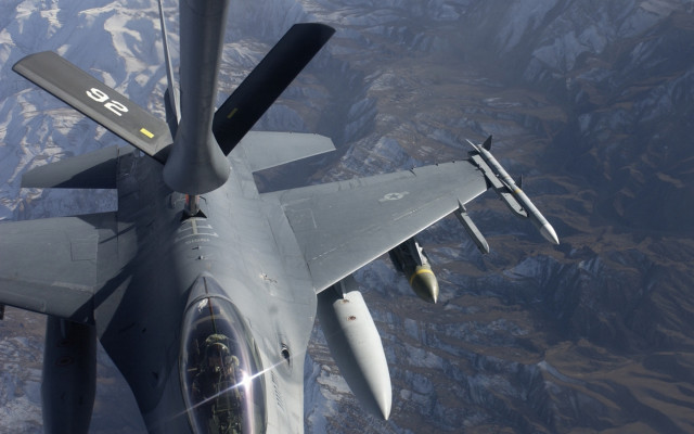 Fighter jet mountain range daytime free wallpaper for desktop - medium preview image