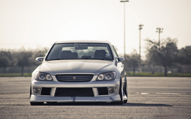 White car parking lot trees #2 free wallpaper for desktop - medium preview image