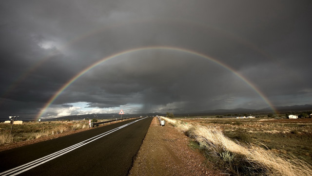 Double rainbow desert road dark free wallpaper for desktop - medium preview image