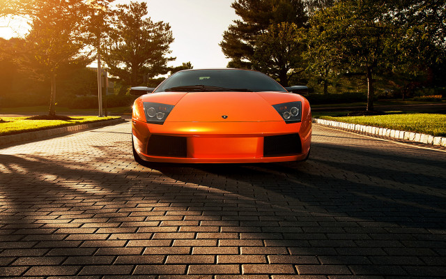 Bright orange sports car brick free wallpaper for desktop - medium preview image