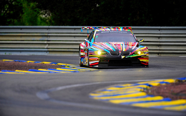 Colorful pixel art racecar on free wallpaper for desktop - medium preview image