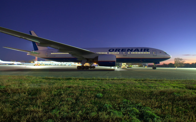 Large airplane runway night photorealism free wallpaper for desktop - medium preview image