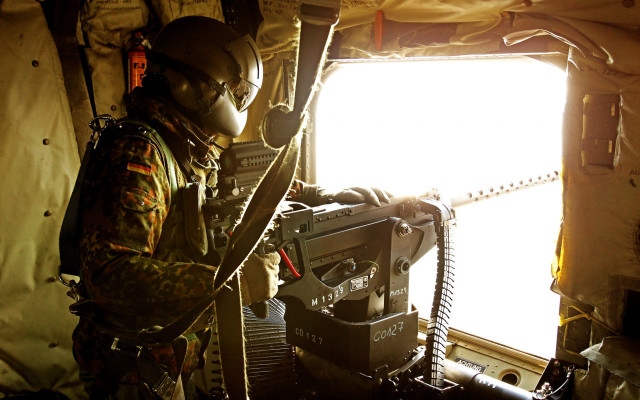 Man military machine room window free wallpaper for desktop - medium preview image