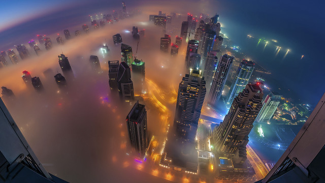 Cityscape tall buildings fog nighttime free wallpaper for desktop - medium preview image