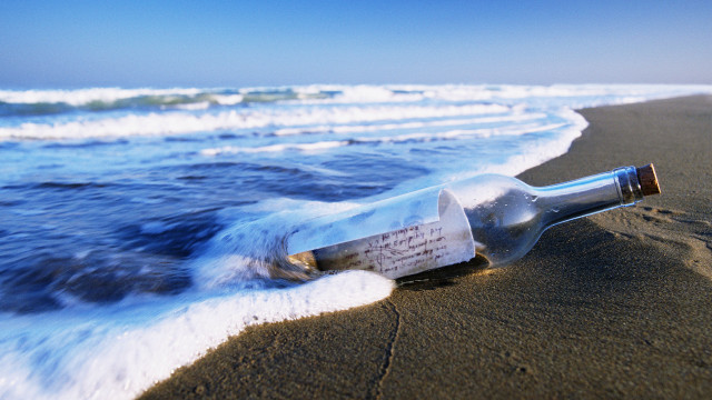 Bottle message beach waves sky free wallpaper for desktop - medium preview image