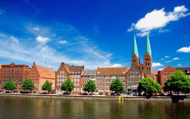 Cityscape bridge river sky clouds free wallpaper for desktop - medium preview image