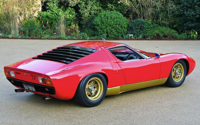 Red gold sports car forest free wallpaper for desktop - medium preview image