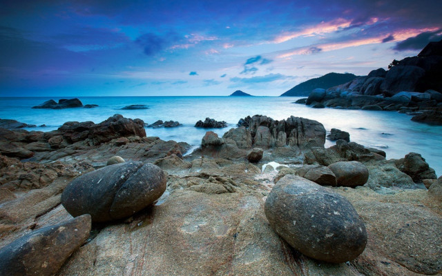 Rocky beach dusk purple sky free wallpaper for desktop - medium preview image