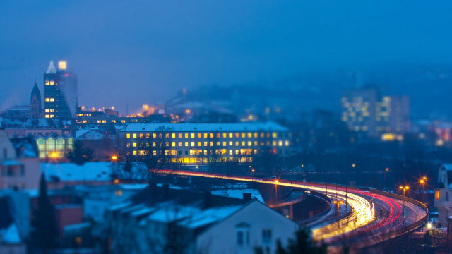 City skyline traffic night blurry free wallpaper for desktop - medium preview image