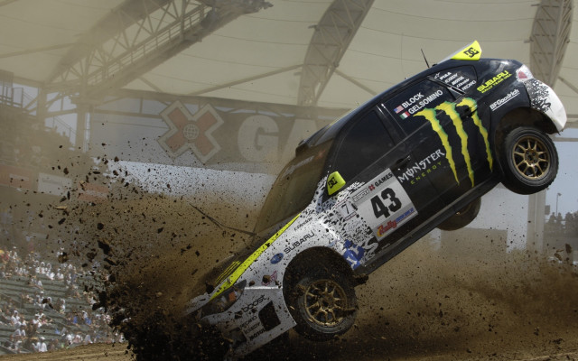 Monster truck jumping dirt stadium free wallpaper for desktop - medium preview image