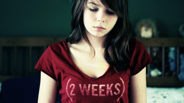 Woman red shirt cellphone dark free wallpaper for desktop - medium preview image