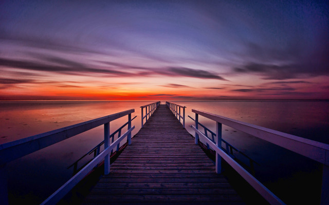 Sunset pier mountain ocean water free wallpaper for desktop - medium preview image