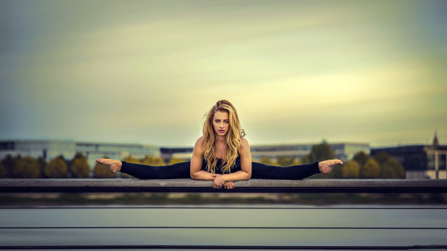 Yoga woman urban background blonde free wallpaper for desktop - medium preview image