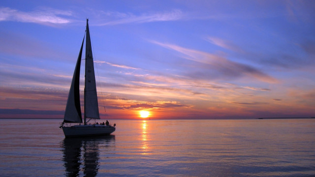 Sailboat ocean sunset dusk beach free wallpaper for desktop - medium preview image