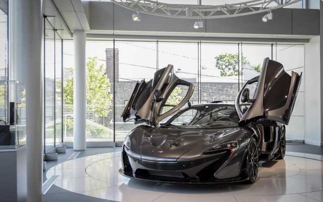 Car parked building open doors free wallpaper for desktop - medium preview image