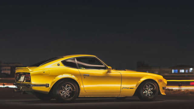 Yellow sports car night city free wallpaper for desktop - medium preview image