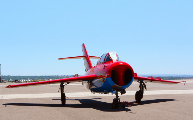 Red blue plane runway sky free wallpaper for desktop - medium preview image