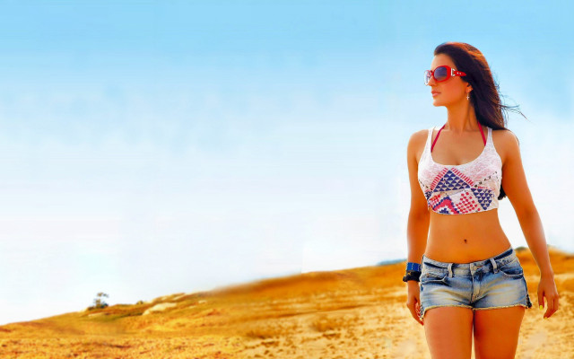 Desert beach woman denim shorts free wallpaper for desktop - medium preview image