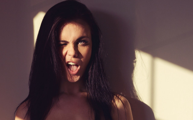 Funny face blowing hair tilted free wallpaper for desktop - medium preview image