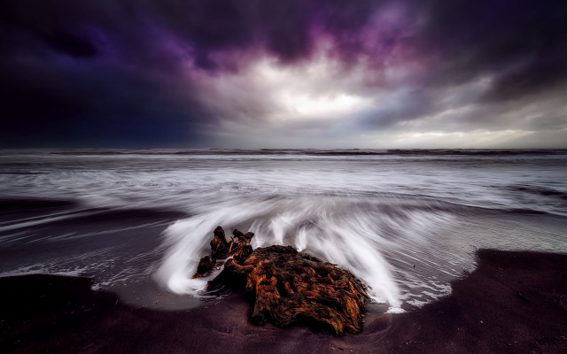 Rock beach storm purple sky free wallpaper for desktop - medium preview image