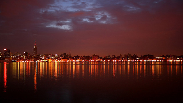 City skyline reflection red glow free wallpaper for desktop - medium preview image