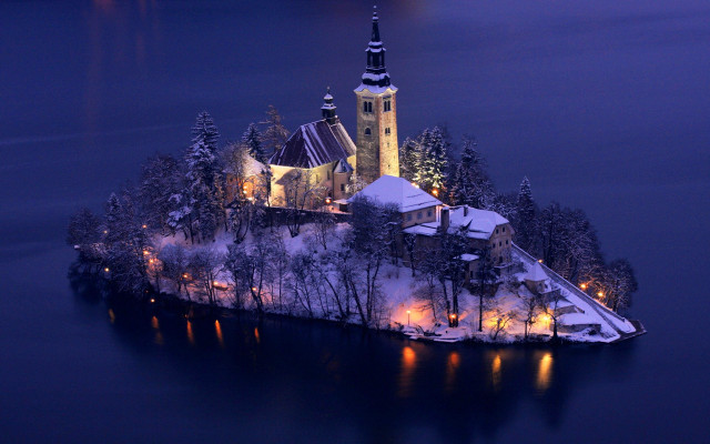 Small island church lit night free wallpaper for desktop - medium preview image