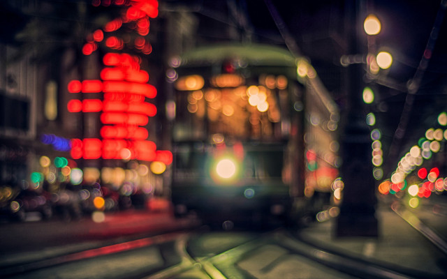 City street night train bokeh free wallpaper for desktop - medium preview image