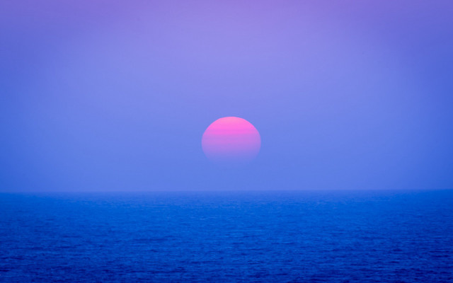 Orange sunset ocean purple horizon free wallpaper for desktop - medium preview image
