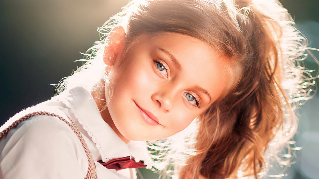 Young girl bow tie white free wallpaper for desktop - medium preview image